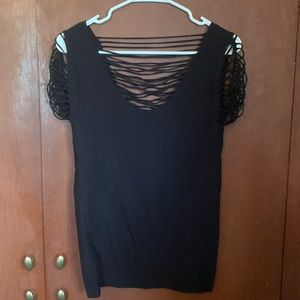 Black fitted shirt with string details.